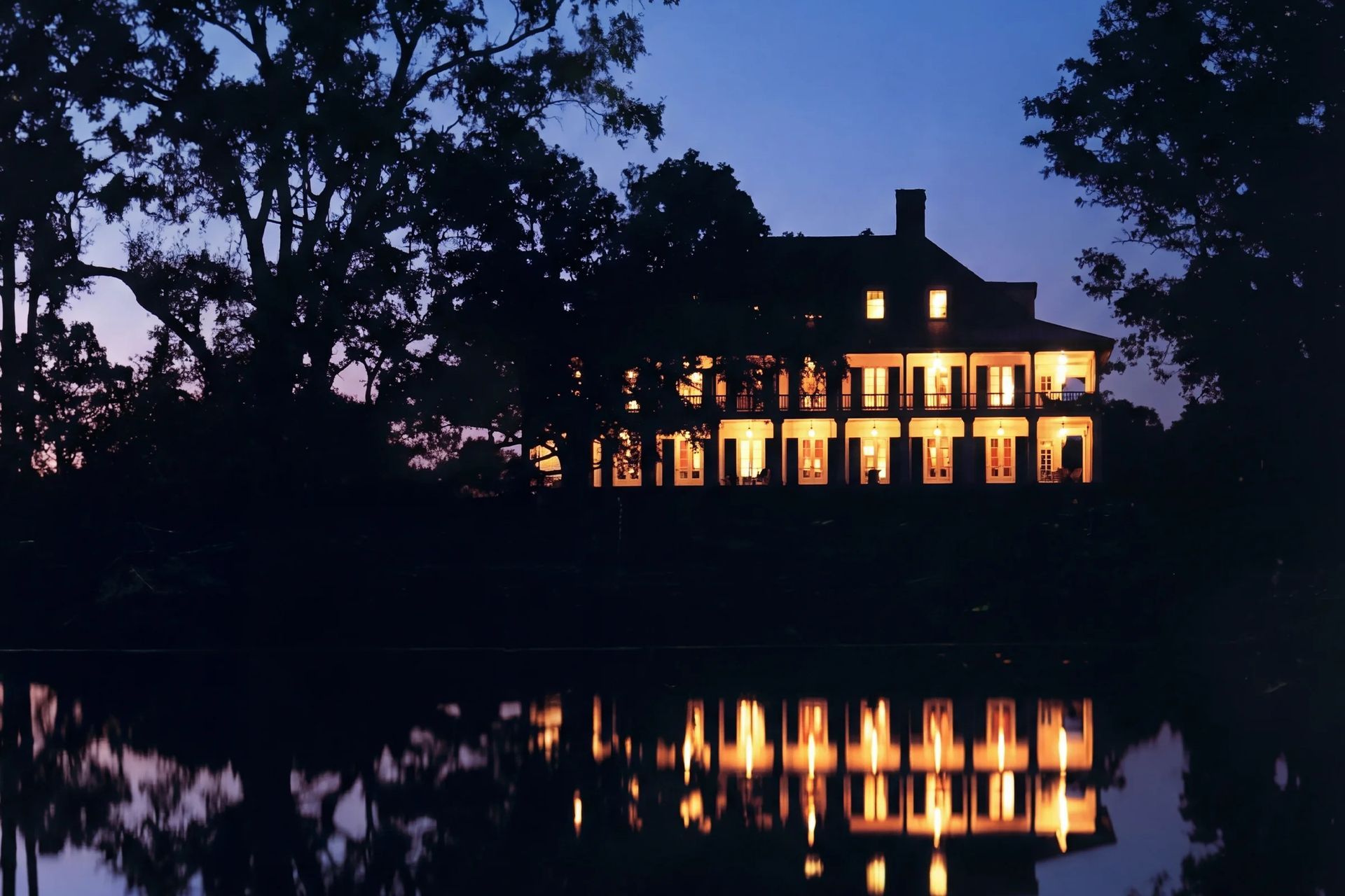 georgian-lowcountry-manor-architectural-design-dusk-colonnade-reflection-ap-compressed.jpg