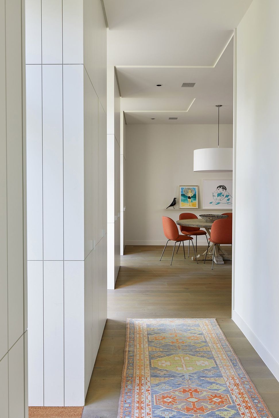 10ForestParkCuppettKilpatrickArchitectureandInteriorDesignaustin-tx-modern-corridor-hidden-millwork-colorful-rug.jpg