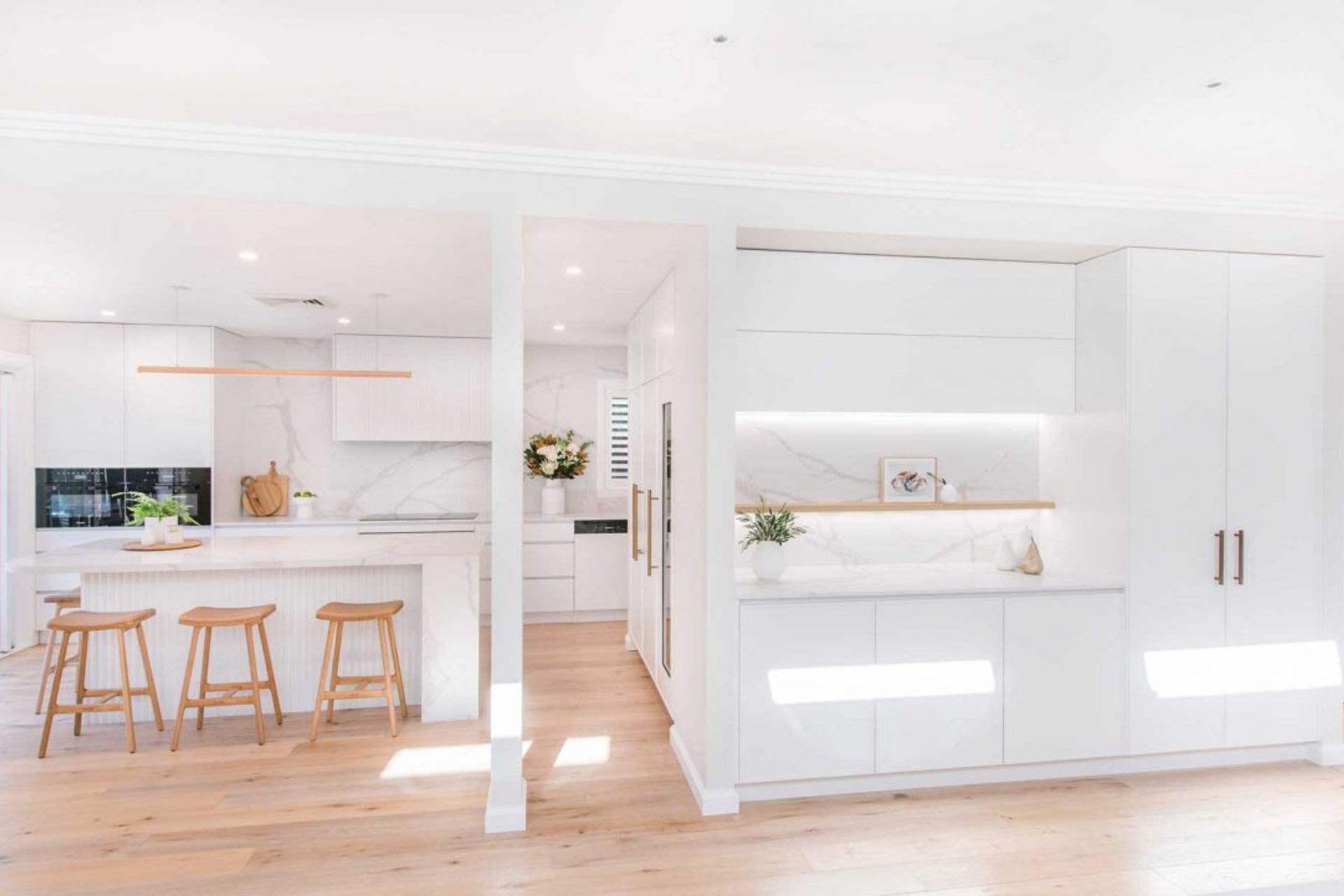 005-Modern-White-Kitchen-and-lounge-space-Mosman-1084x721.jpg