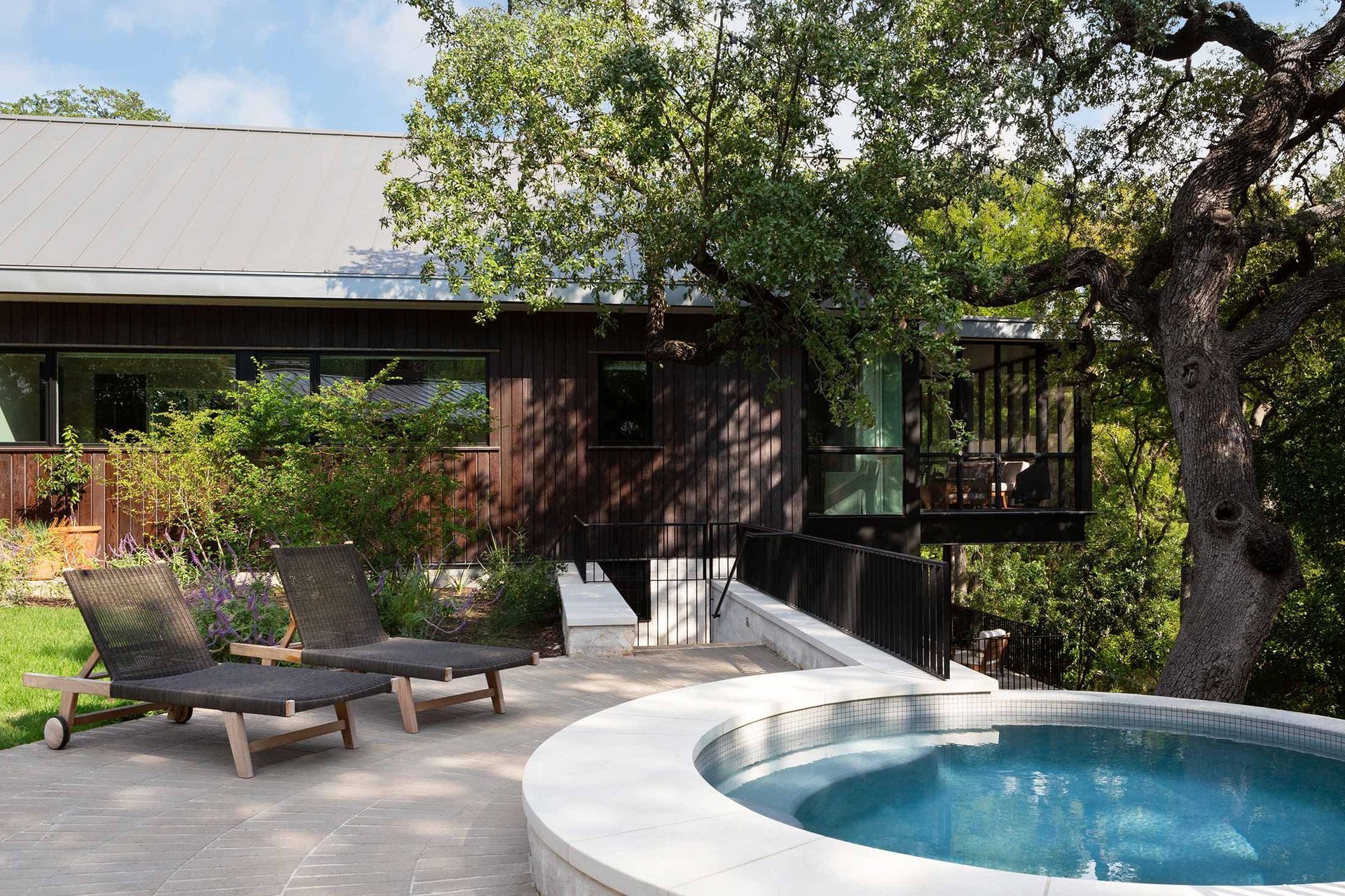 25BelmontParkCuppettKilpatrickArchitectureandInteriorDesignaustin-tx-house-plunge-pool-cantilevered-porch.jpg