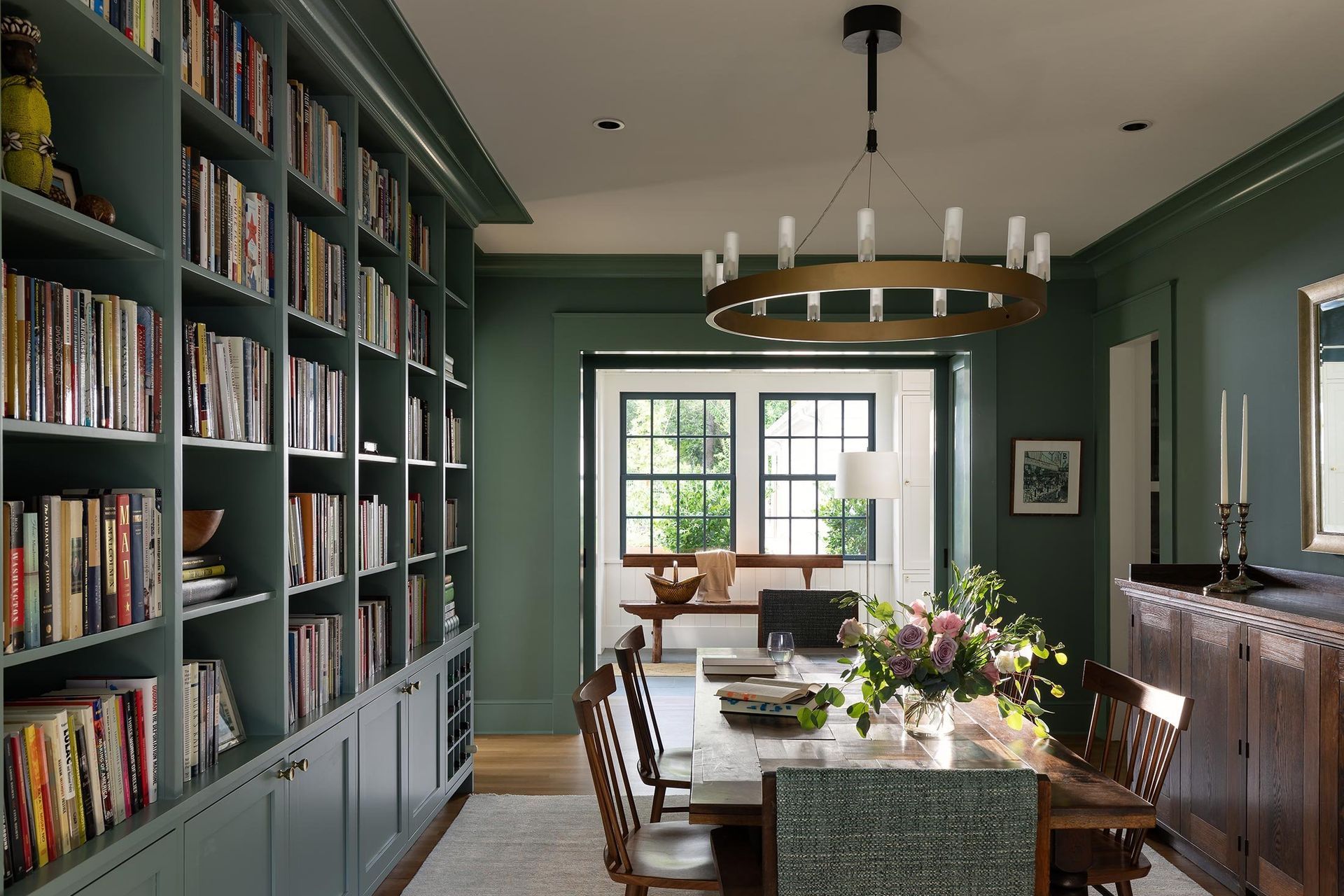9GriswoldCuppettKilpatrickArchitectureandInteriorDesignaustin-tx-dining-library-green-bookshelves-chandelier.jpg