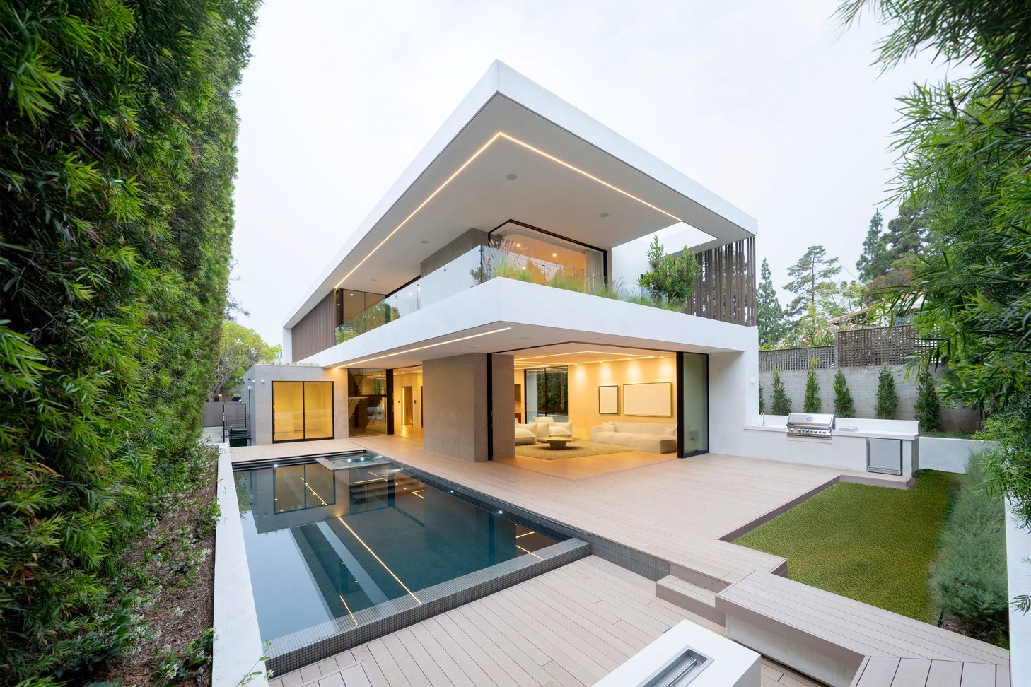 The indoor/outdoor plan is arranged on the lot to optimize a connection with the private
backyard and pool.