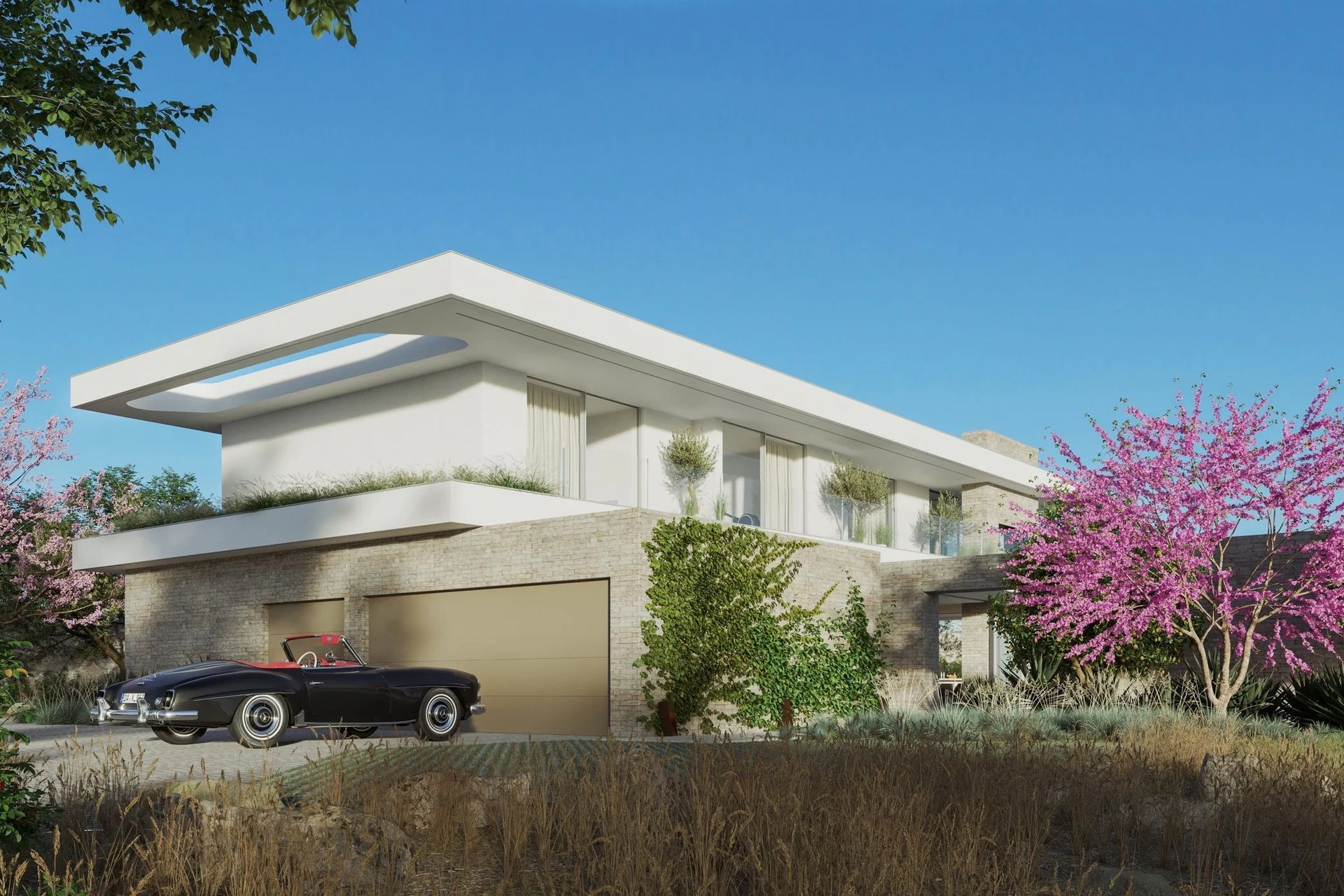 The Malibu residence is guarded at the front with a garage and barrier wall in brick to shield the interiors from headlights coming up the drive.