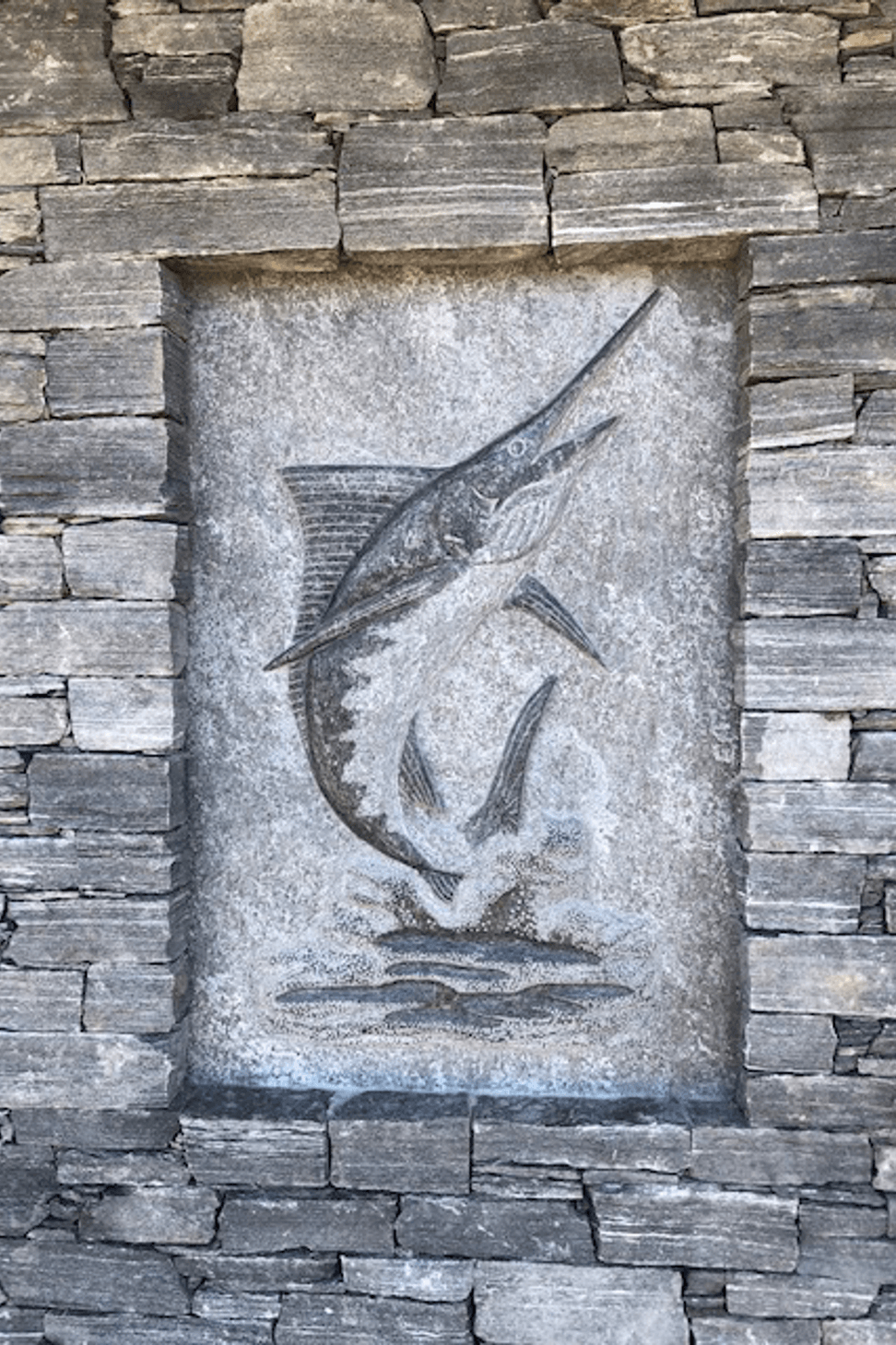 Carved marlin by A World Of Stone Ltd in West Coast Schist