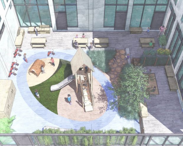 Architectural landscape illustration viewed from above, depicting a landscaped courtyard or outdoor communal area enclosed by a modern multi-storey building with extensive glazing. The space includes curved paved paths, planted garden beds, timber outdoor seating and tables, a central children's play structure with slide, and people using the courtyard. The drawing uses loose hand-rendered lines and muted natural colours.