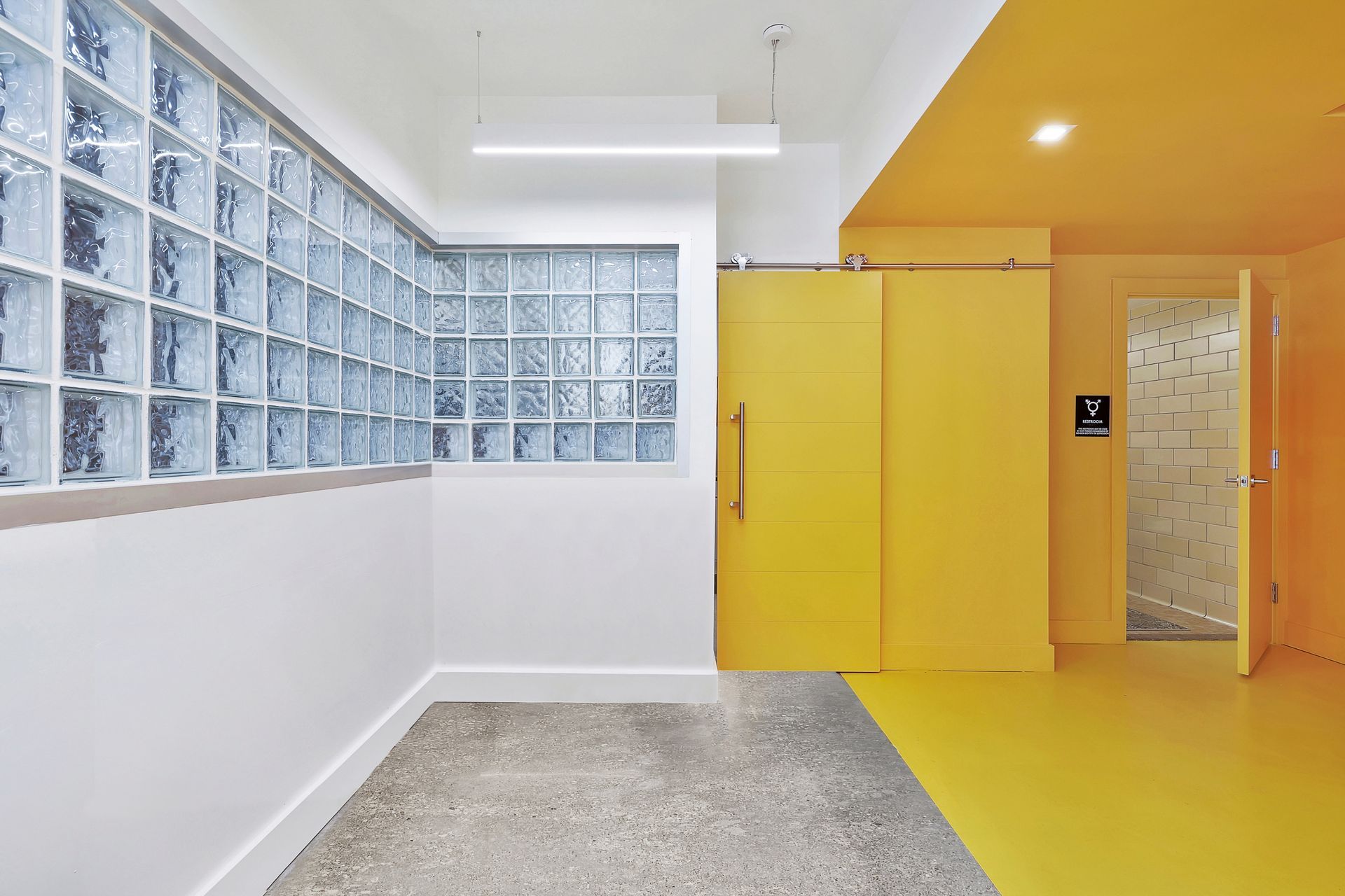 Entry-Lobby-View-of-Existing-Glass-Block-and-New-Design-ap-compressed.jpg