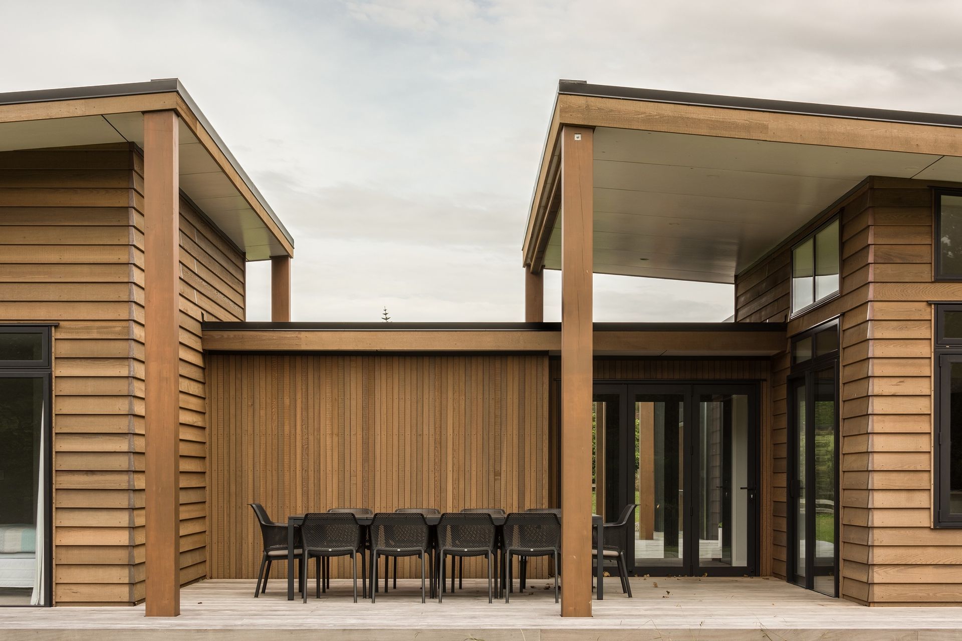 Soaring monoptich roofs provide ample covered outdoor areas.