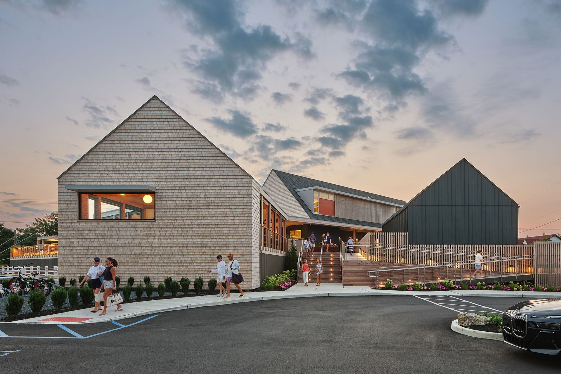 somers-point-paddle-club-main-entry-dusk-modern-gables.jpg