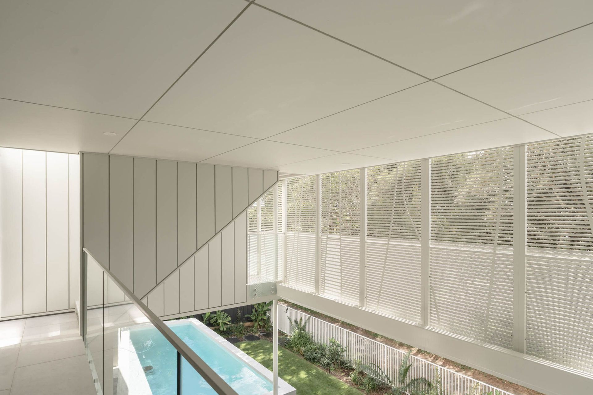 Eleutheria - Pool. Lap pool running alongside the glazed walkway.