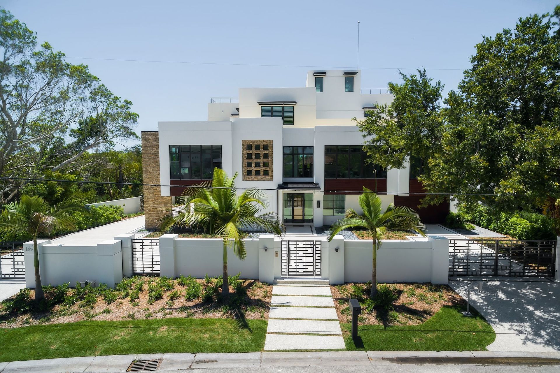 mangrove-bay-front-elevation-gated-entry-cmsa-architect-sarasota-upscaled-by-Replicate.jpg