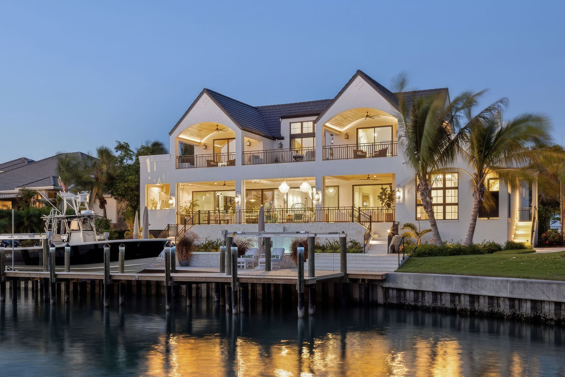 modern-four-square-sarasota-luxury-rear-elev-night-upscaled-by-Replicate.jpg