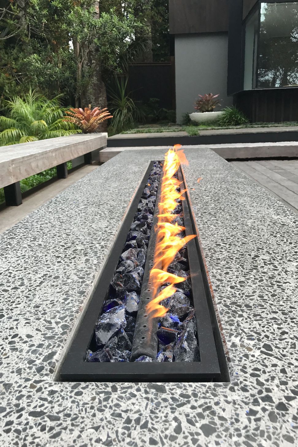 Fire pit table. Designed by lanzscapes