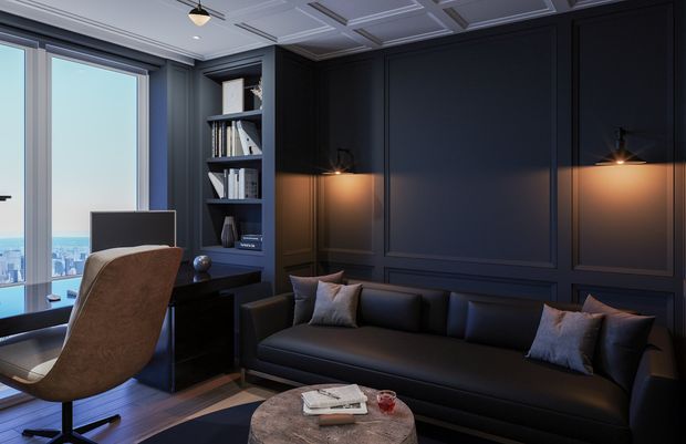 A sophisticated dark-toned living room and home office with floor-to-ceiling corner glazing overlooking a city and water view. The room features deep navy or charcoal decorative wall panelling, a coffered ceiling, integrated shelving, a compact dark desk, sculptural upholstered office chair, black leather sofa, warm wall sconces, and a round stone coffee table. The atmosphere is moody, refined, and luxurious.