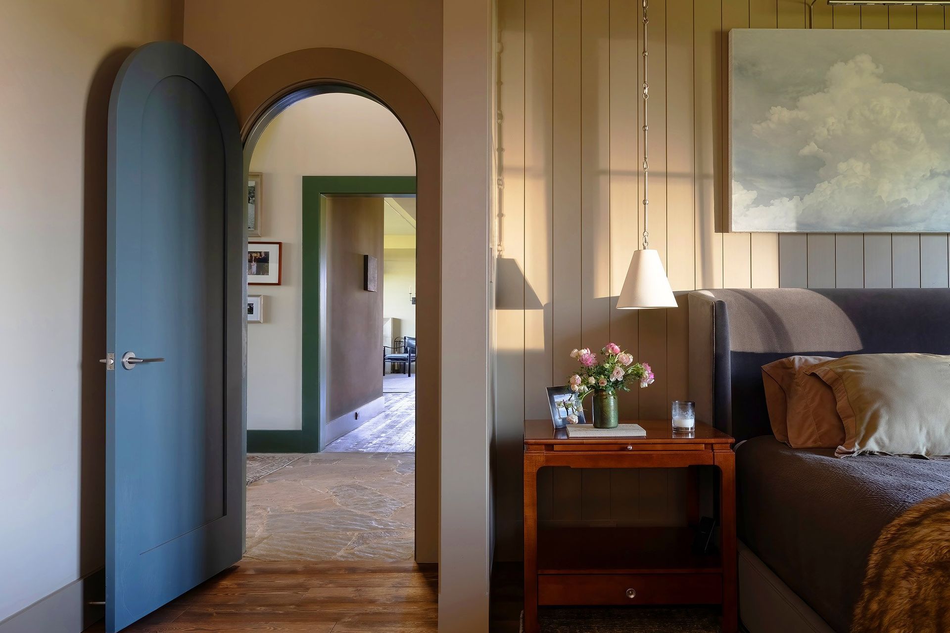 9HomeontheRangeCuppettKilpatrickArchitectureandInteriorDesignarched-doorway-blue-wood-floor-bedroom.jpg