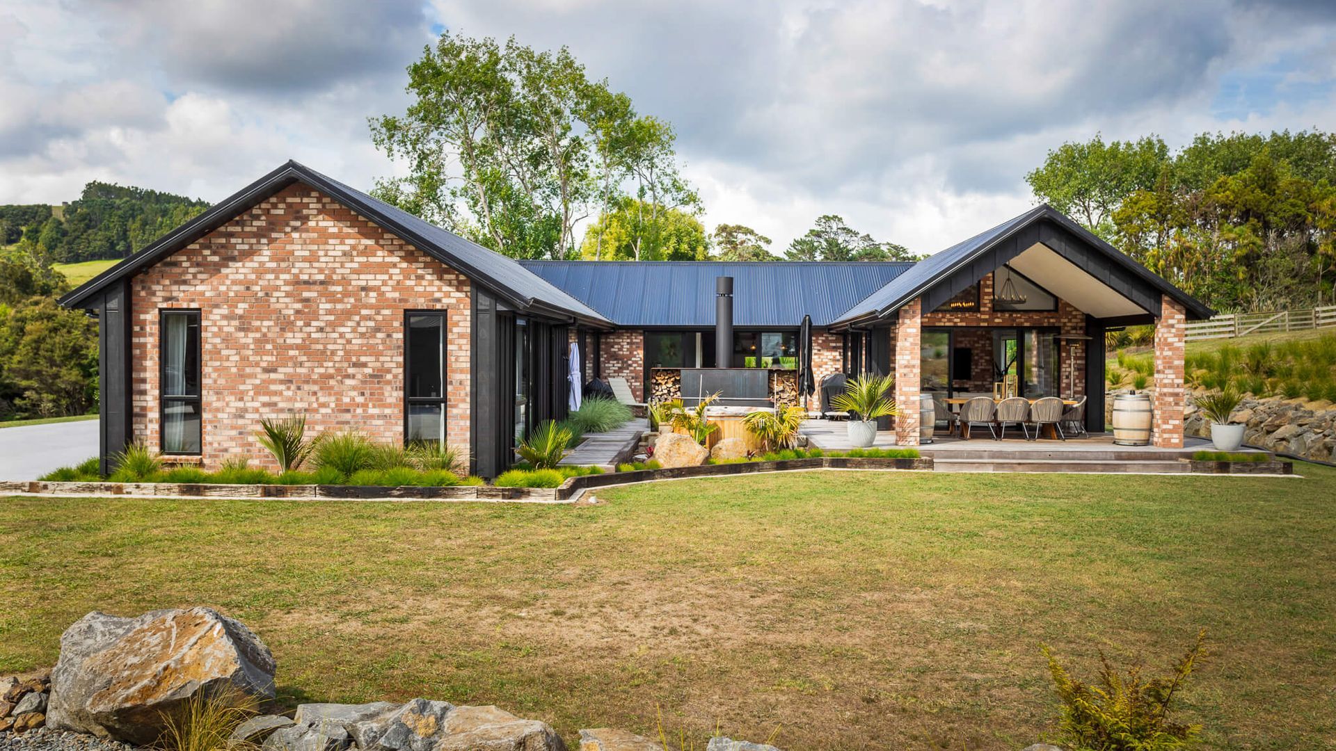 Set amidst the scenic rural landscapes of Muriwai, this beautifully crafted home is a celebration of timeless brickwork, architectural elegance, and modern country living. Designed and built by Madison Park Homes, the residence combines classic materials video