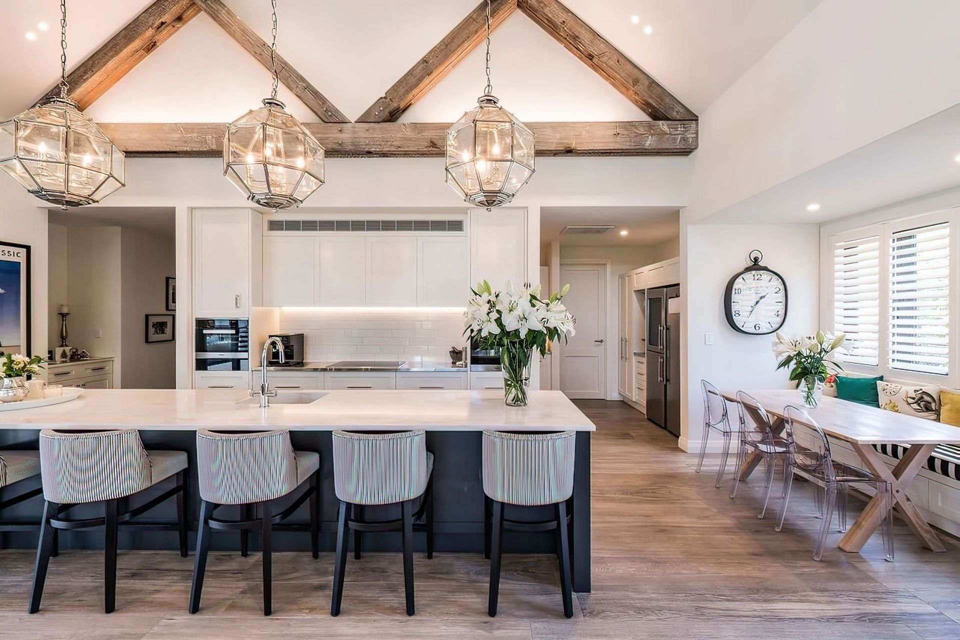 The-kitchen-featuring-exposed-rafters-in-Canadian-Oregon-topaz-very-compressed-2x-v2.jpeg
