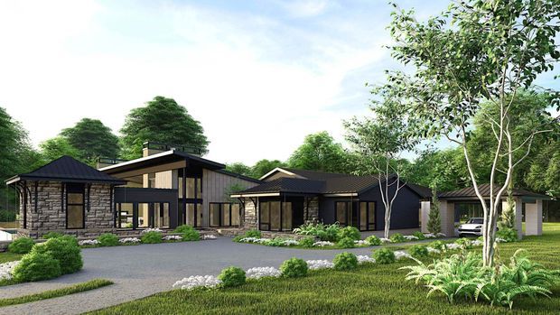 A rendered exterior view of a low-rise residential property with several interconnected pavilion-like volumes, dark pitched roofs, extensive black-framed glazing, and grey stacked-stone feature walls. The landscaped front garden includes clipped shrubs, ornamental planting, lawn, and a broad paved driveway leading toward a covered parking area. The composition suggests a contemporary single-storey home with a slightly raised central volume.