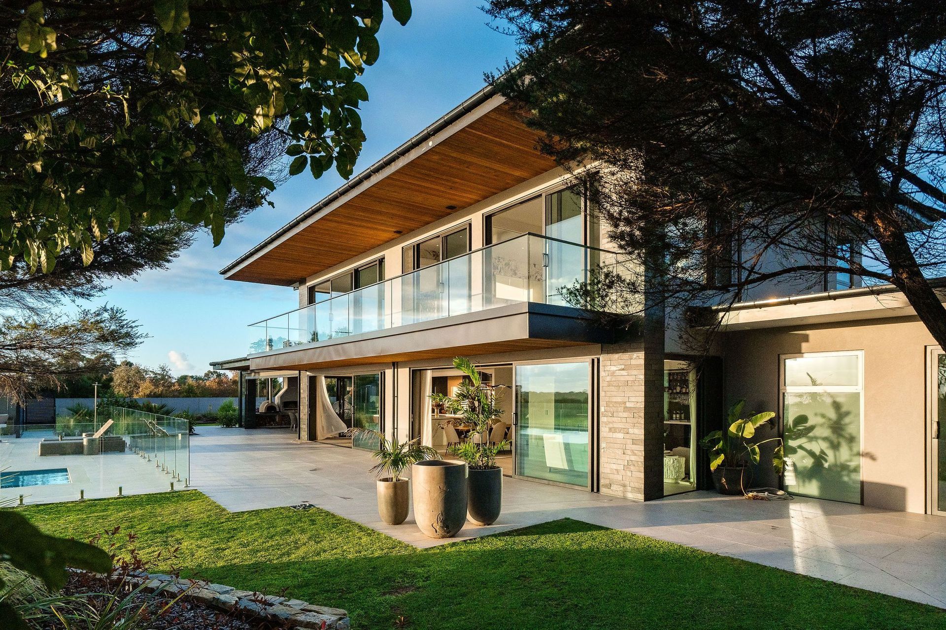 trees-tiling-outdoor-area-eaves-joinery-glass-views-arcline-architecture.jpg