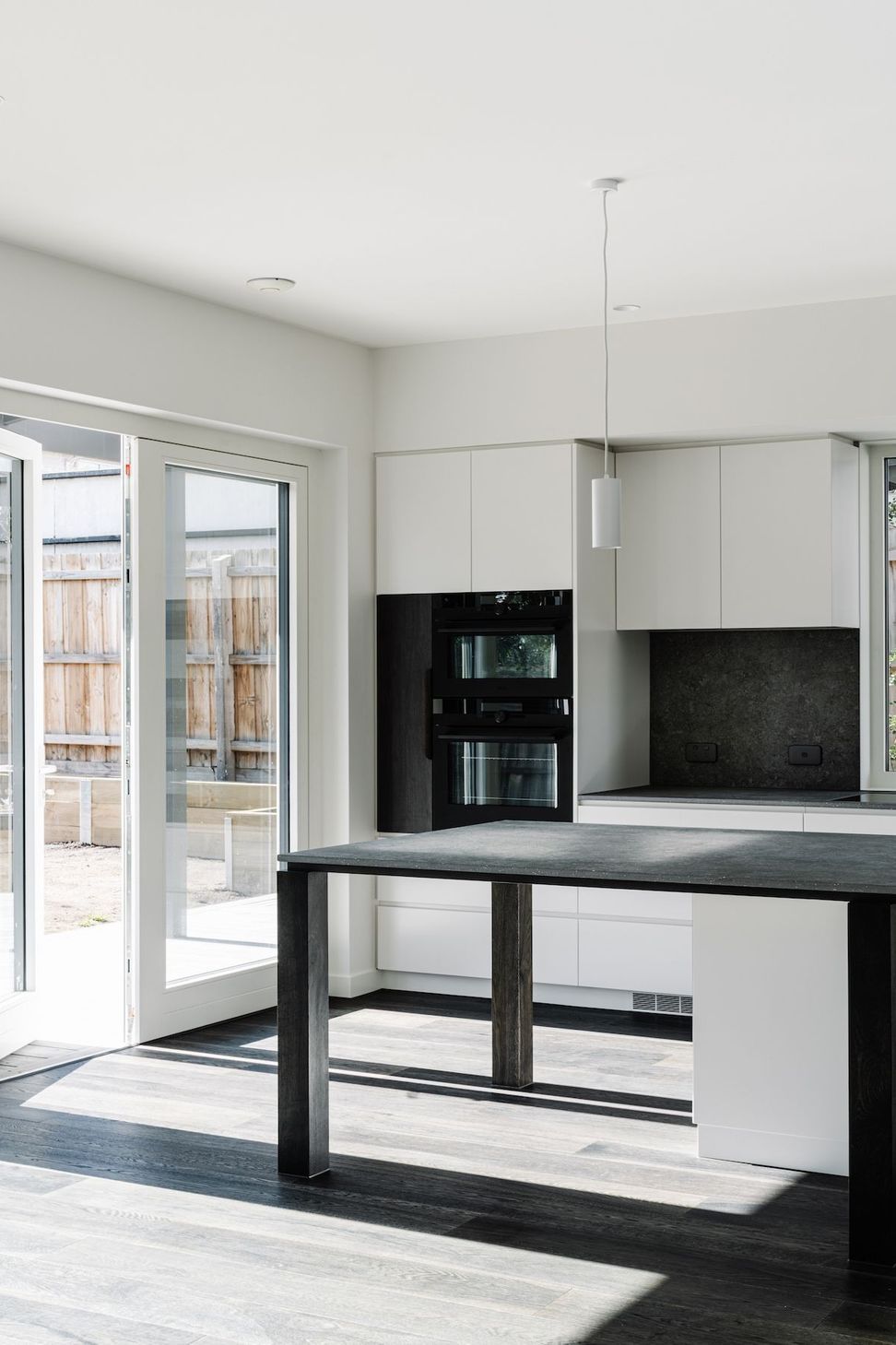 10-portrait-envirotecture-wrighty-tighty-haus-vic-kitchen.jpg