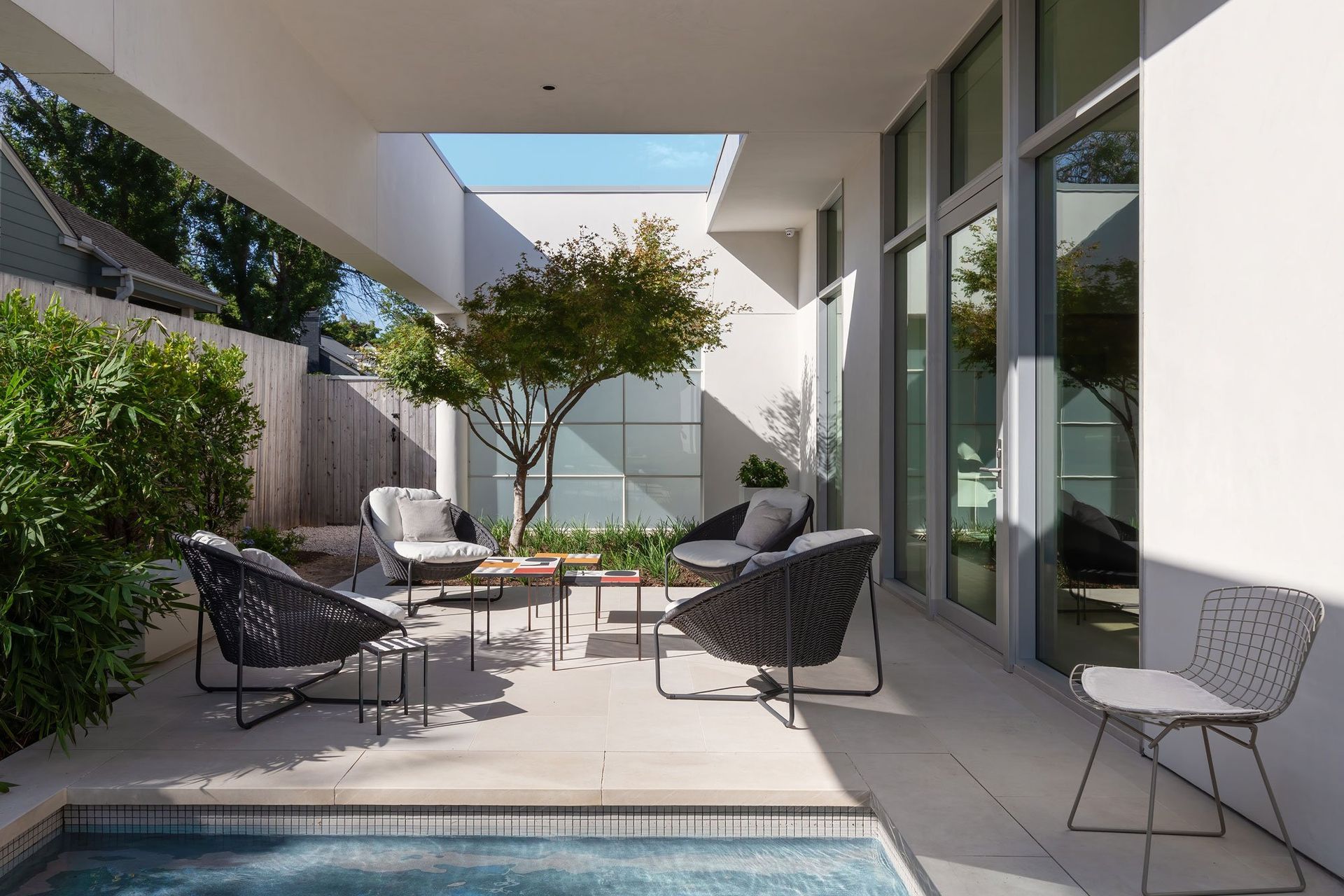 13WethersfieldTownhouseCuppettKilpatrickArchitectureandInteriorDesignmodern-outdoor-living-space-with-pool-austin-texas-architecture.jpg
