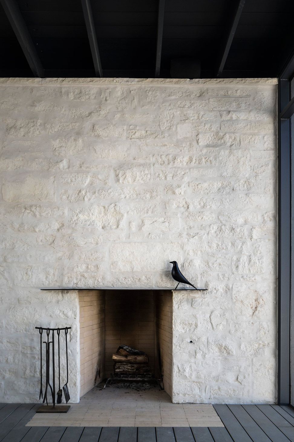 15HillsideCuppettKilpatrickArchitectureandInteriorDesignaustin-tx-fireplace-screened-porch-slurried-limestone-wall.jpg