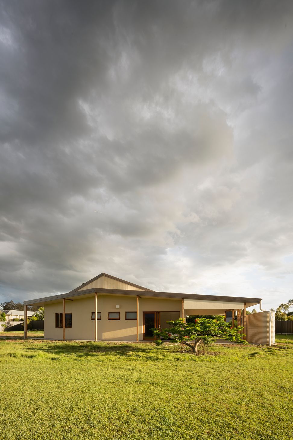 This little shelter is grounded firmly in the landscape. Superbly energy efficient, the home celebrates the subtropical lifestyle, collects winter sun in all the right places, and is packed with accessible features.  Photo: ®Angus Martin
