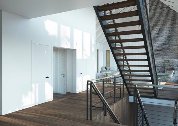 Bright contemporary interior showing a stair landing with an open-riser timber staircase, dark metal structure and balustrade, and warm timber flooring. White walls and flush doors surround the landing, while a textured vertical feature wall and glimpses of living areas are visible beyond the stairs. Strong natural light creates a clean, airy atmosphere.