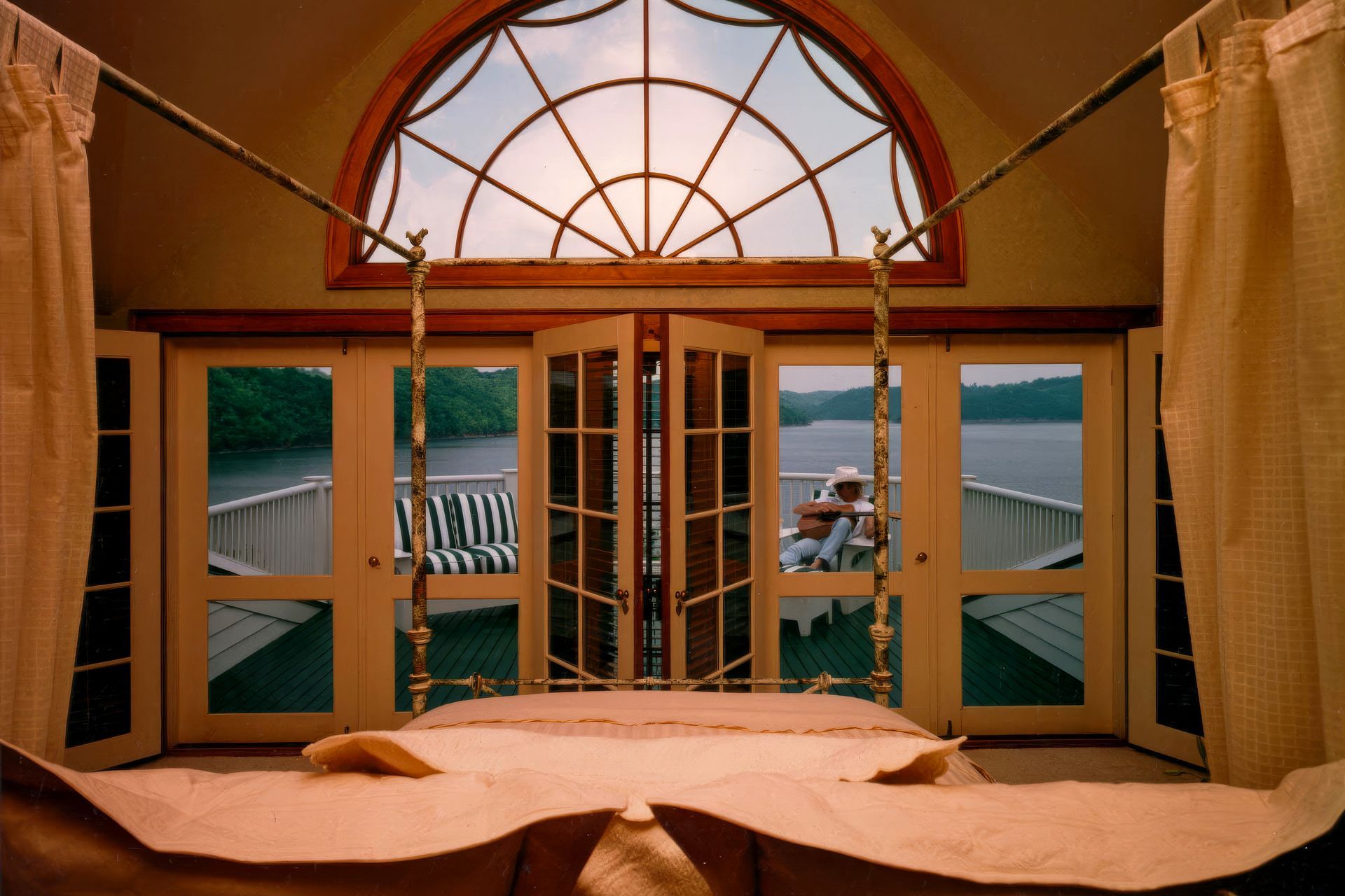 imgi7Lake-House-One-Master-Bedroom-View-upscaled-by-Replicate.jpg