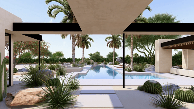 A contemporary desert-inspired outdoor entertaining area with a long rectangular swimming pool, broad pale paving, sculptural shade structures, and integrated lounge seating. The landscape combines palms, ornamental grasses, agaves, cacti, rocks, and clipped trees, creating a resort-like courtyard setting with strong indoor-outdoor openness.