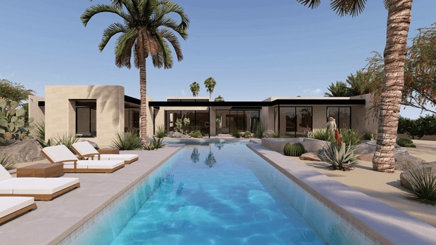 A single-storey modern residence arranged around a long rectangular swimming pool. The home features low, flat rooflines, expansive dark-framed glazing, pale stone or rendered walls, and a minimalist pool terrace with loungers. Palm trees, sculptural succulents, cacti, and sandy landscaping create a warm desert-resort setting.