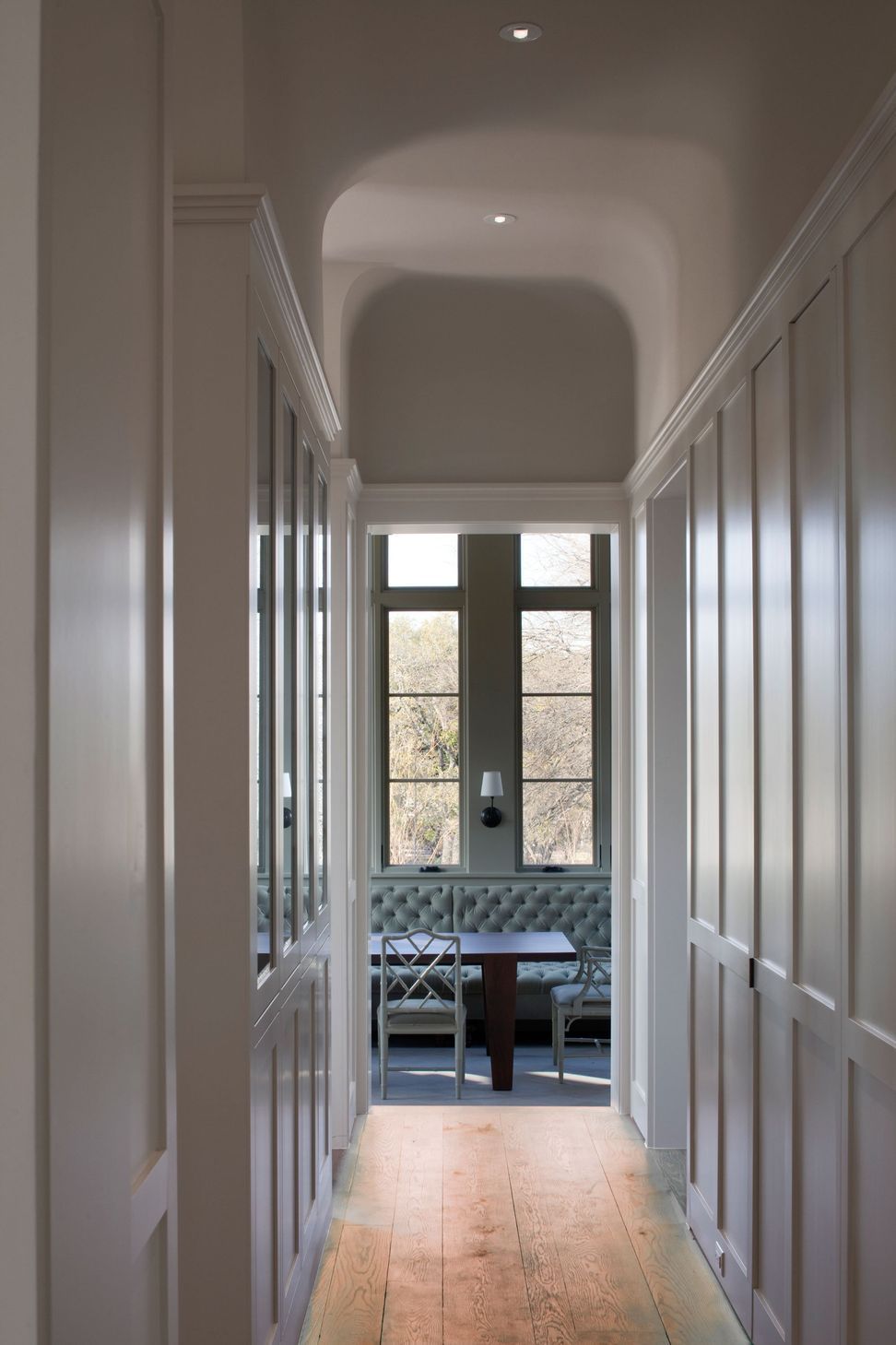 8UrbanHomesteadCuppettKilpatrickArchitectureandInteriorDesignaustin-tx-paneled-hallway-dining-room-view-v2.jpg